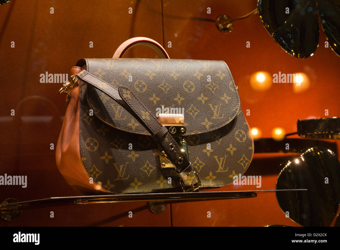 louis-vuitton-bag-displayed-in-window-showcase-D2X2CK.jpg